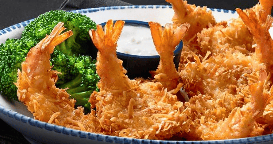 Fried shrimp on a plate with broccoli 