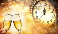 Clock at midnight on New Year's Eve in Atlanta, with champagne toast