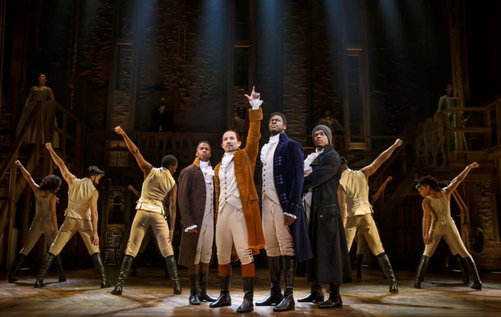 the cast of Hamilton onstage