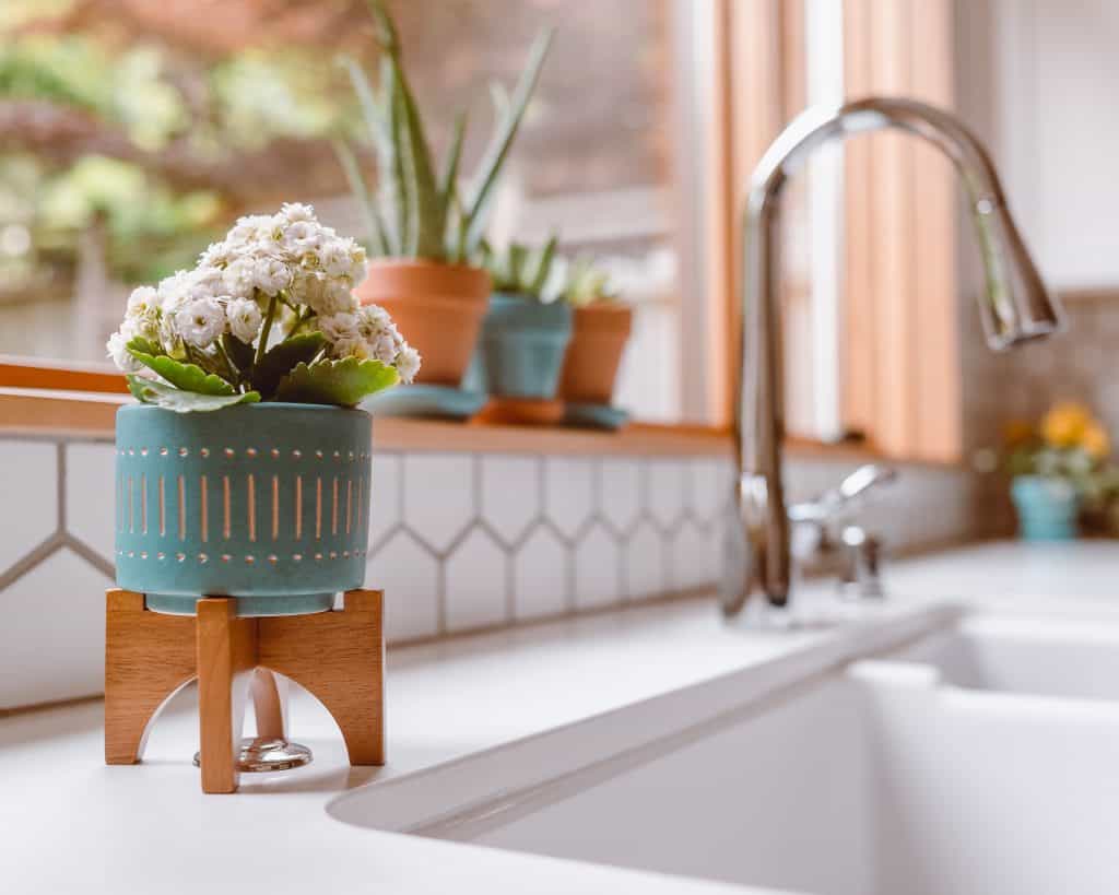 atlanta home show display with kitchen sink and decorative tile